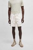 Regular fit-shorts tillverkade av stretchtyg i bomullstwill med tryck , Vit för 1399 kr på Hugo Boss